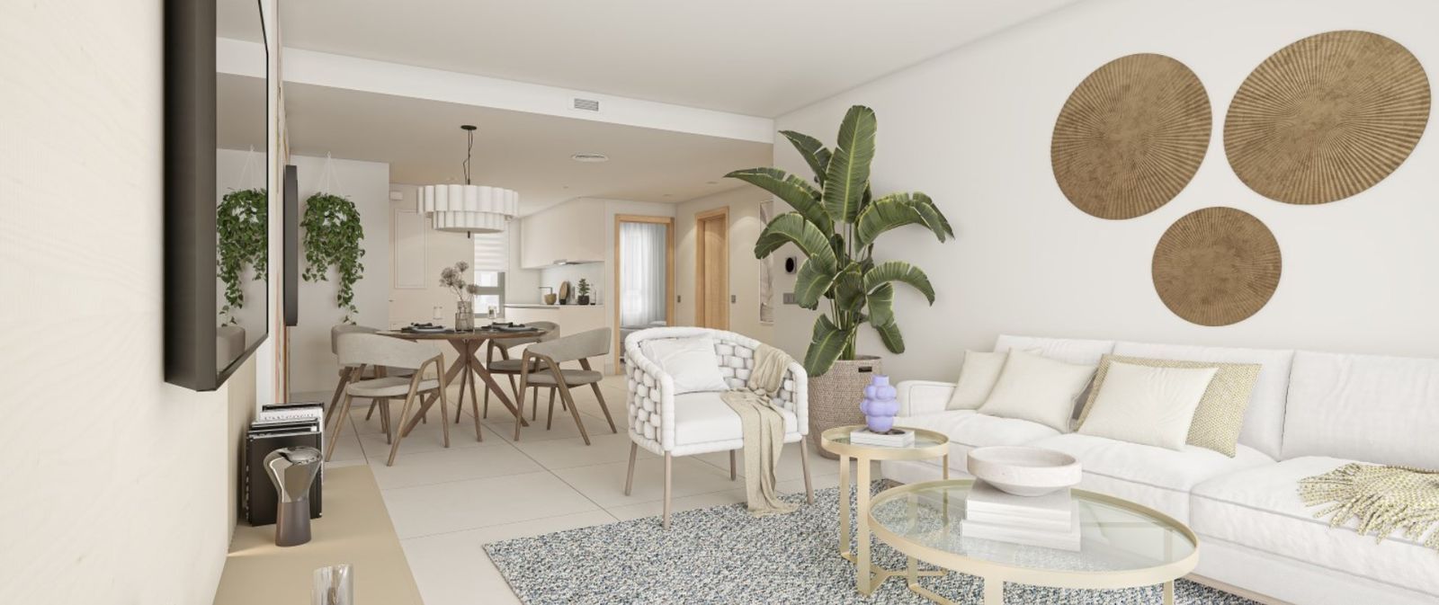 Spacious living and dining area with modern furniture, large plants, and elegant decor, open-plan kitchen visible.